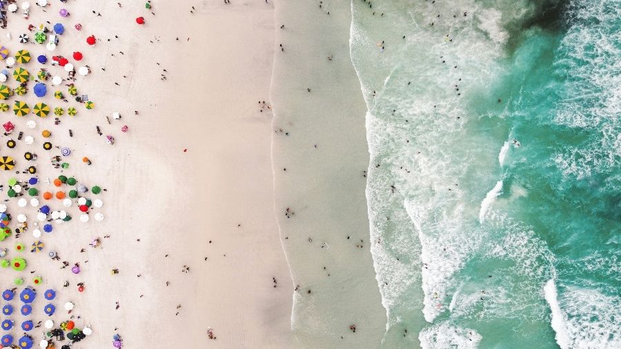 beach with leisure tourists from above