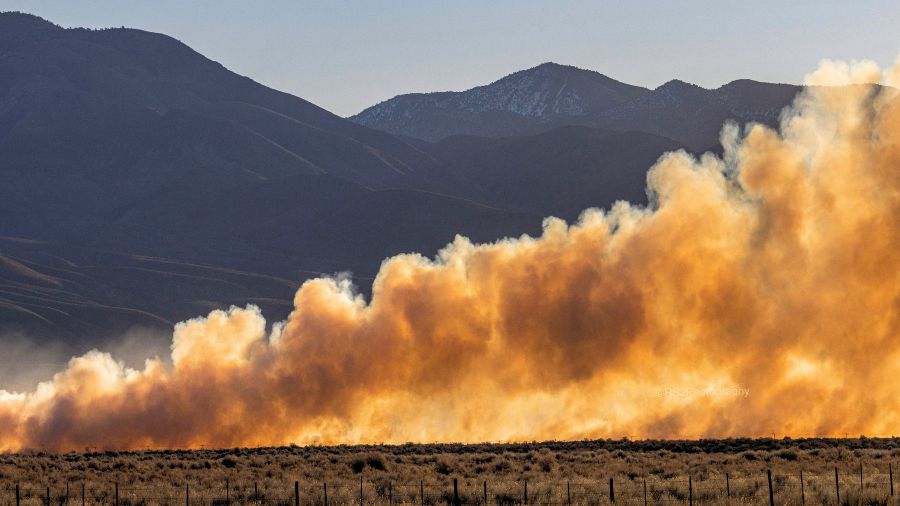 a wildfire fills the view