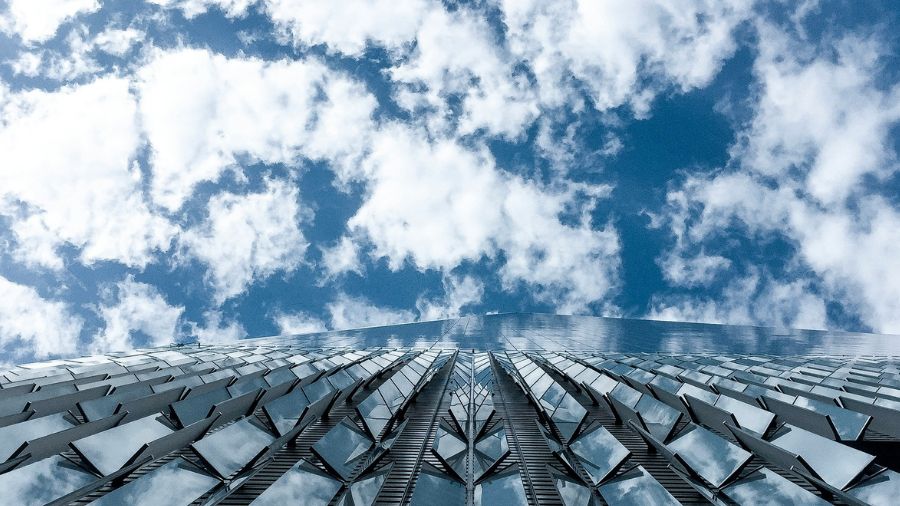 city skyscraper and cloudy sky