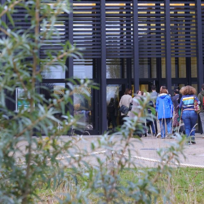 delegates walking into a conference centre