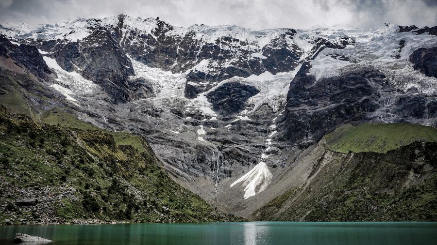 mountainside with light blue lake